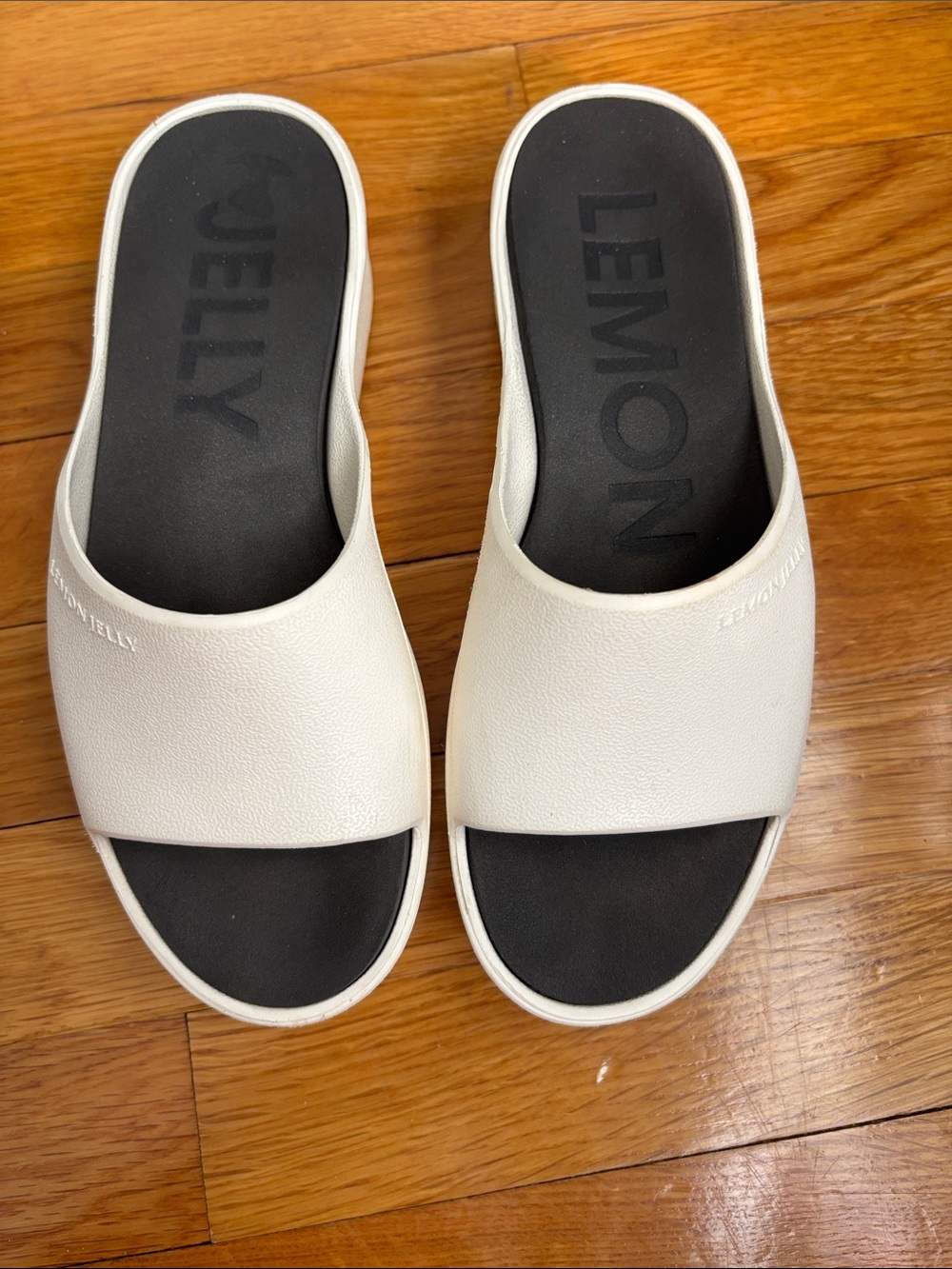 Lemon Jelly Women's White Slide Sandals with Black Footbed